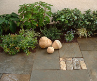 Small hardscape details like this cobble square provides visual interest.