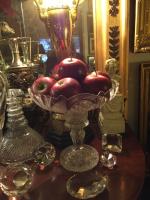 Faux apples in a crystal compote look so real.
