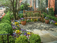 A front yard patio is an inviting place to sit.