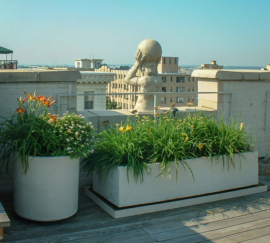 A gargoyle stands watch on this rooftop garden. : Rooftop and Balcony Gardens : CITYSCAPES® Landscaping LLC