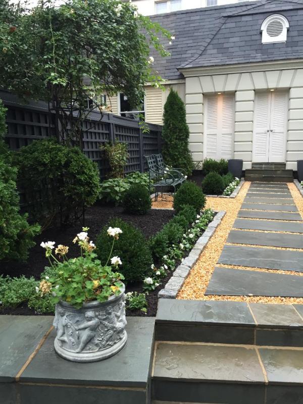 Flagstone and pea  gravel bordered in cobblestones. : Featured Garden : CITYSCAPES® Landscaping Inc.