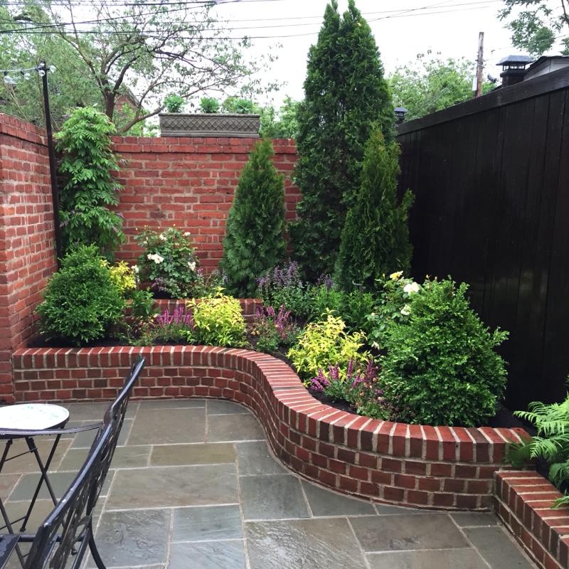 Repeating the shape of the bed in both corners of the patio creates a more formal style. : Georgetown, Capitol Hill, and NW Gardens : CITYSCAPES® Landscaping LLC