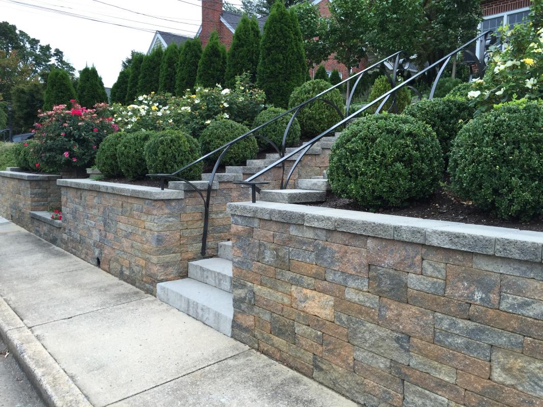 Custom made iron railing adds a highly decorative detail. : Garden Details : CITYSCAPES® Landscaping LLC