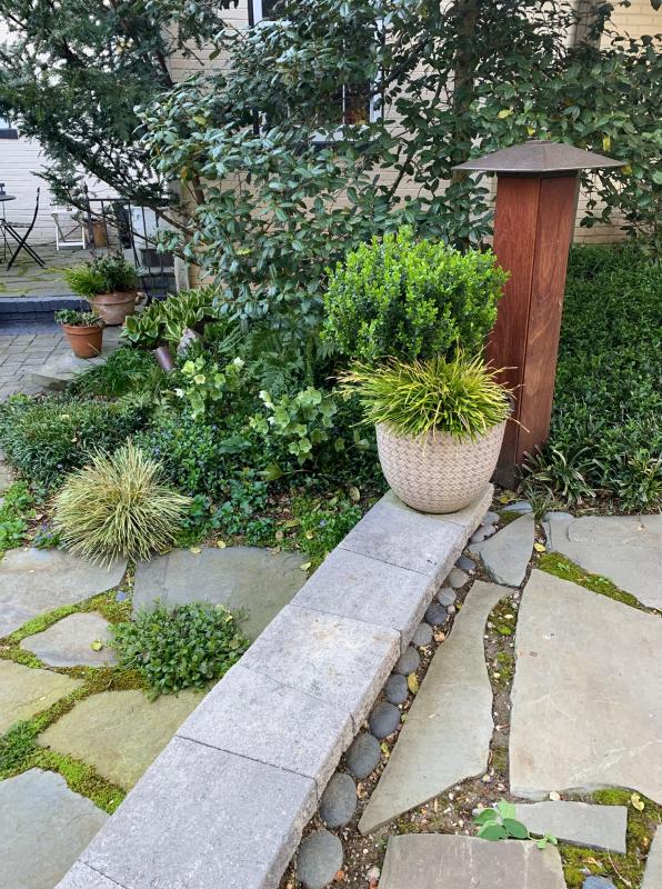 Curved walls provide additional seating. : Suburban Gardens : CITYSCAPES® Landscaping LLC